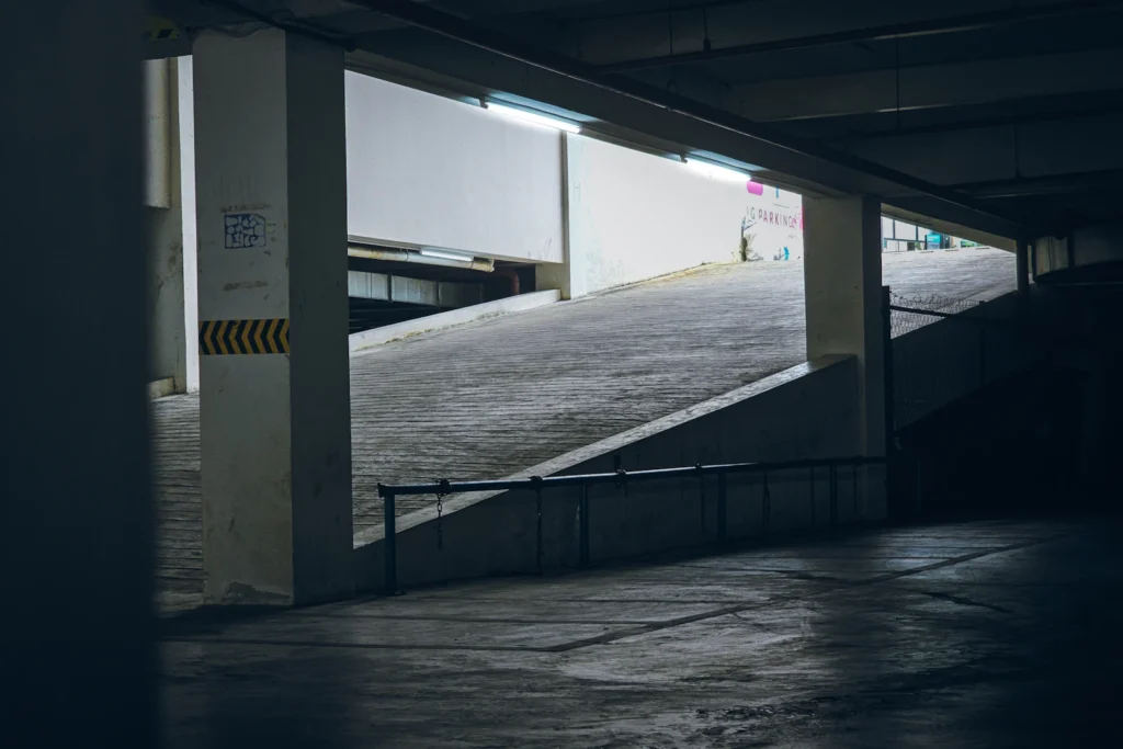 Empty parking garage level and ramp, the high wear areas where a deck coating needs a heavier wear coat